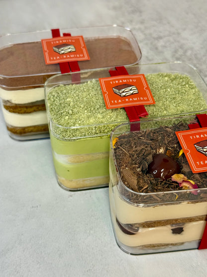 Assorted flavours of Tiramisu in mini tubs. Flavours include Classic, Matcha and Oolong